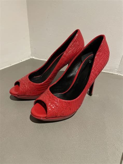 versace scarpe rosse